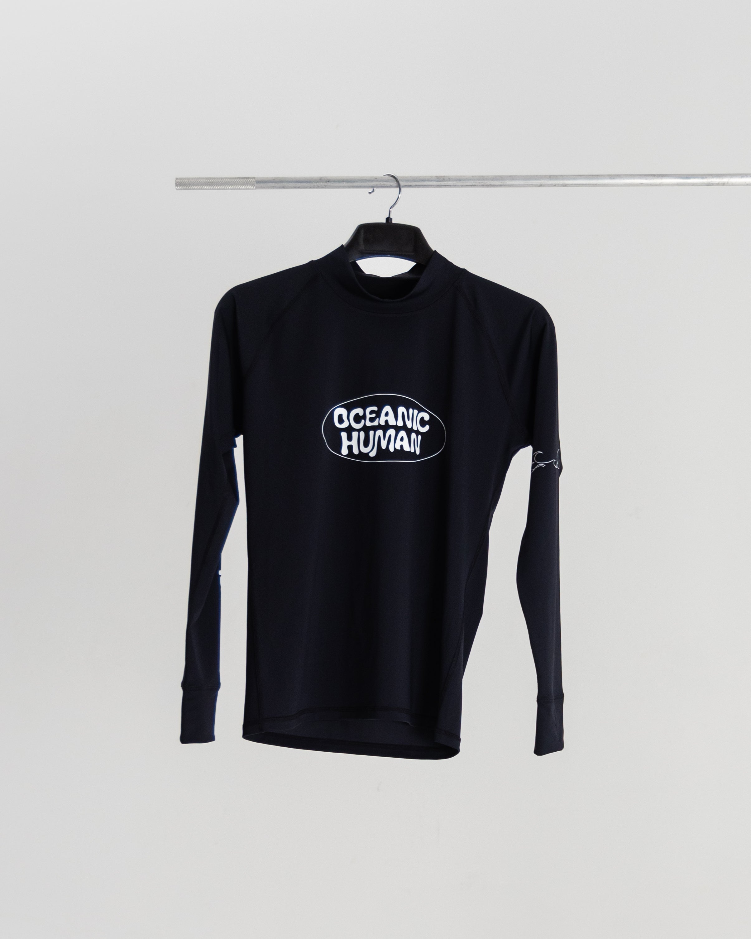 Ocean Waste to Ocean Protection: Our Journey with the Oceanic Human Rash Guard