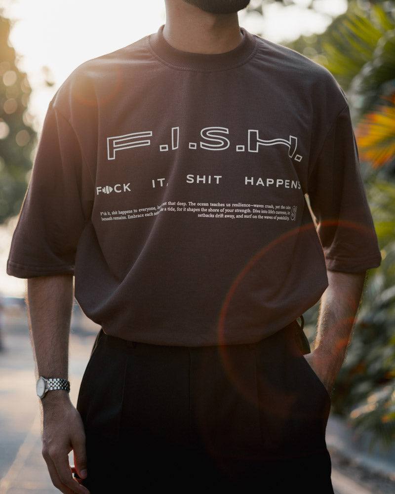 F.I.S.H. - Brown T-ShirtA testament to how fish just keep swimming through the bad currents and the good, through whatever life sends their way. Every day is a new adventure! 
Fit style: Ov- BrownSurface Interval