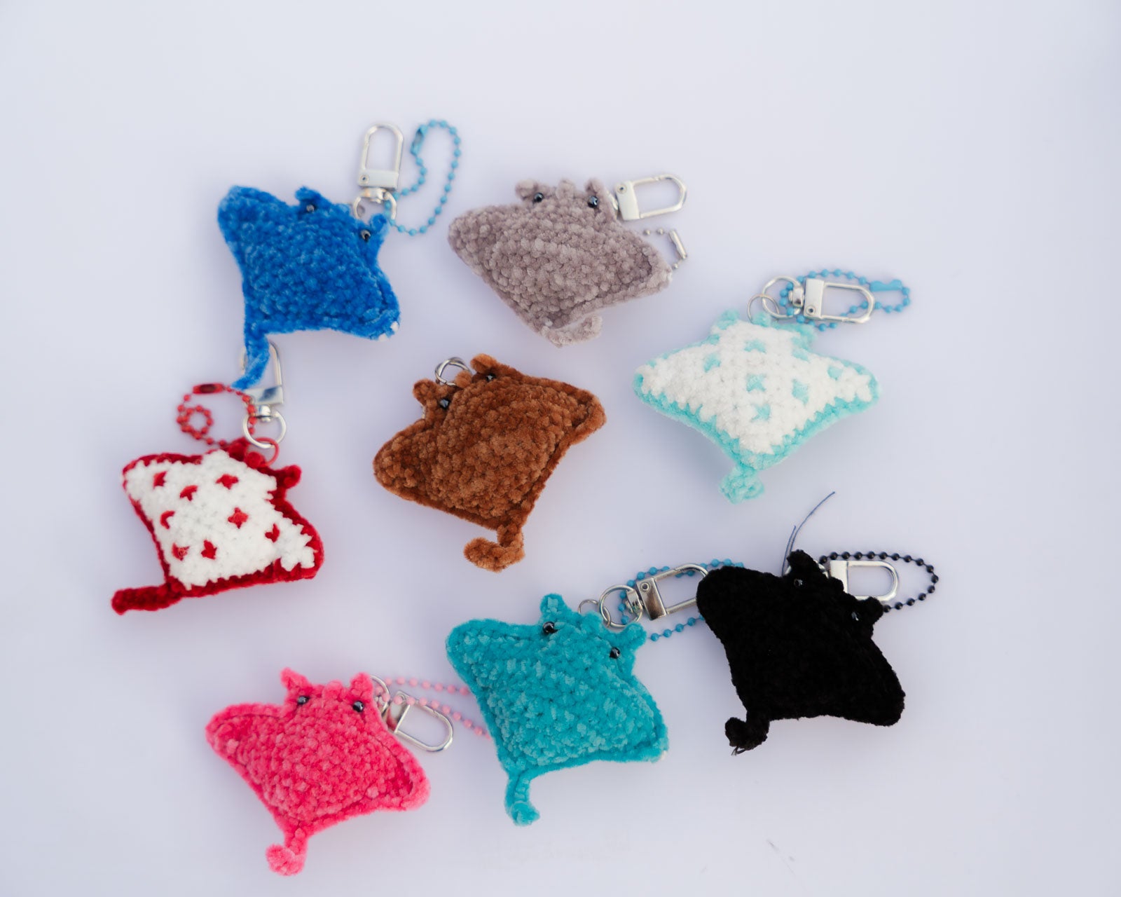 Collection of colorful crochet manta rays  keychains