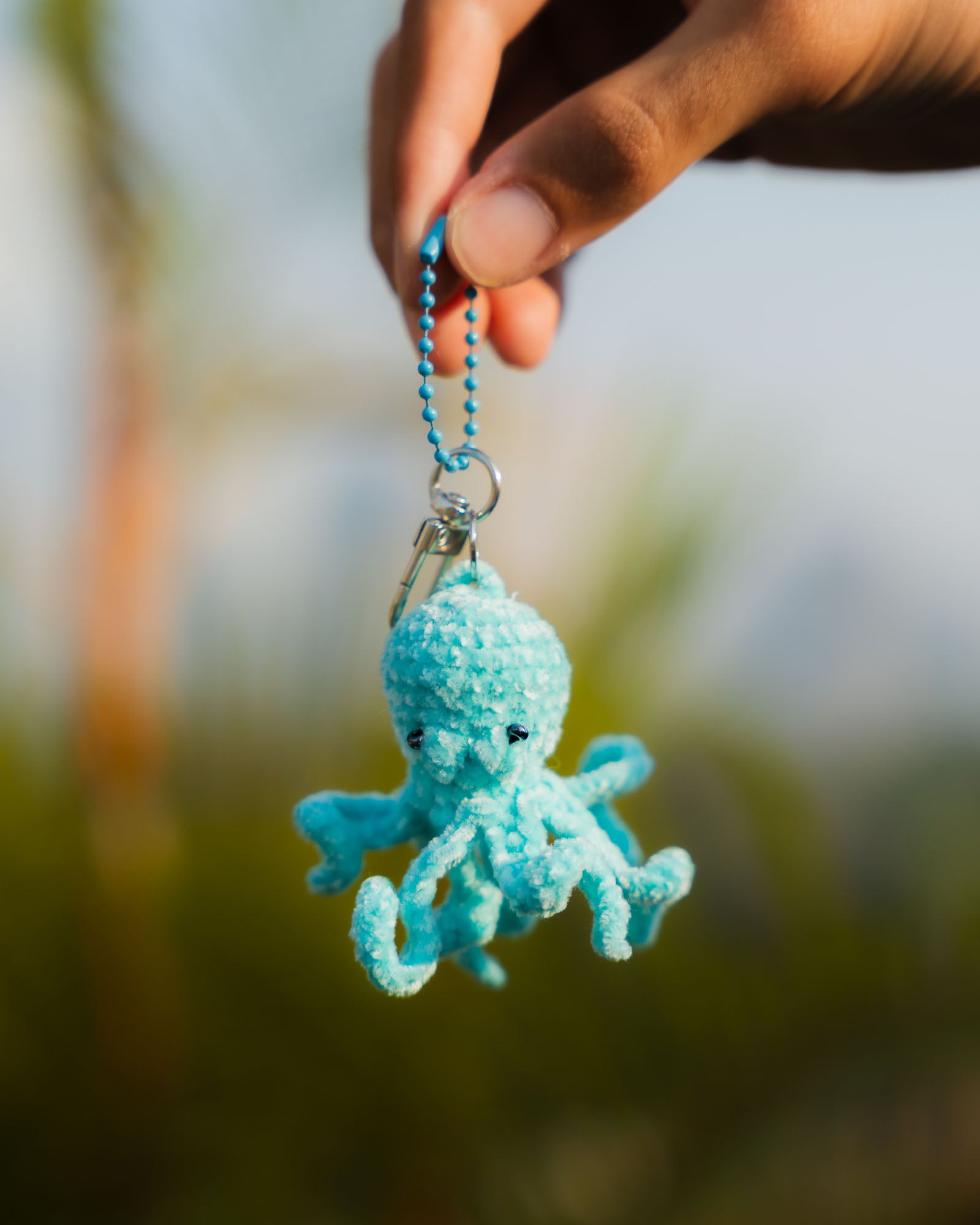 Turquoise octopus keychain by Opi